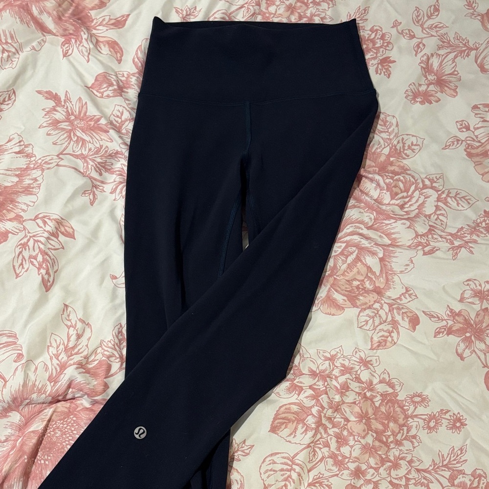 Lululemon Navy Leggings. Excellent condition. Adjustable waistband.